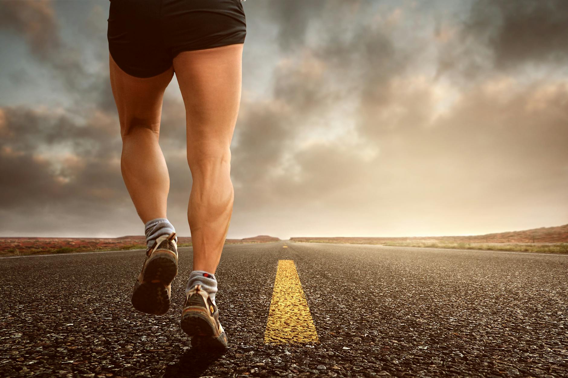 Man walking on a road, representing a healthy lifestyle journey.